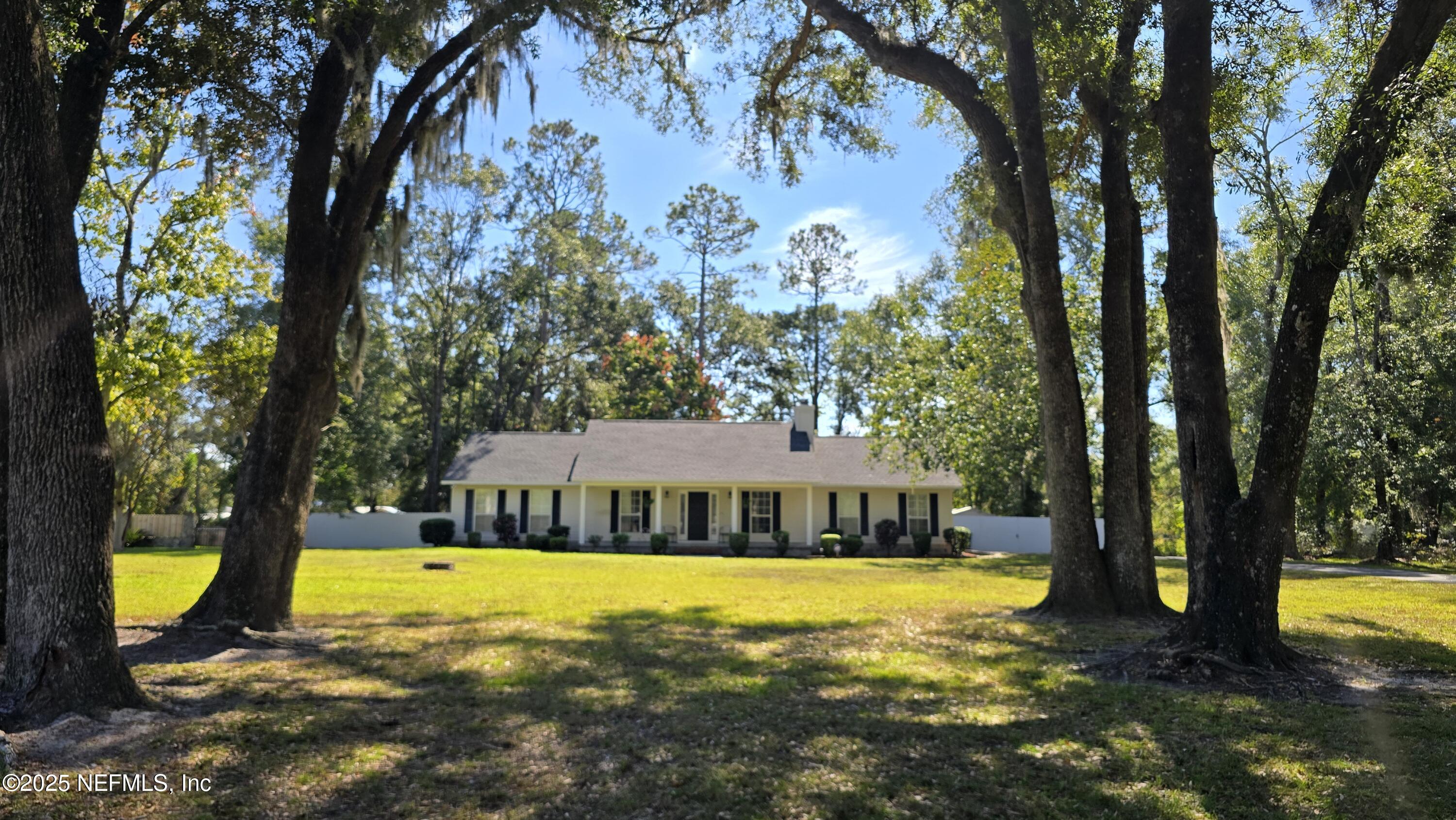 a view of swimming pool with garden area