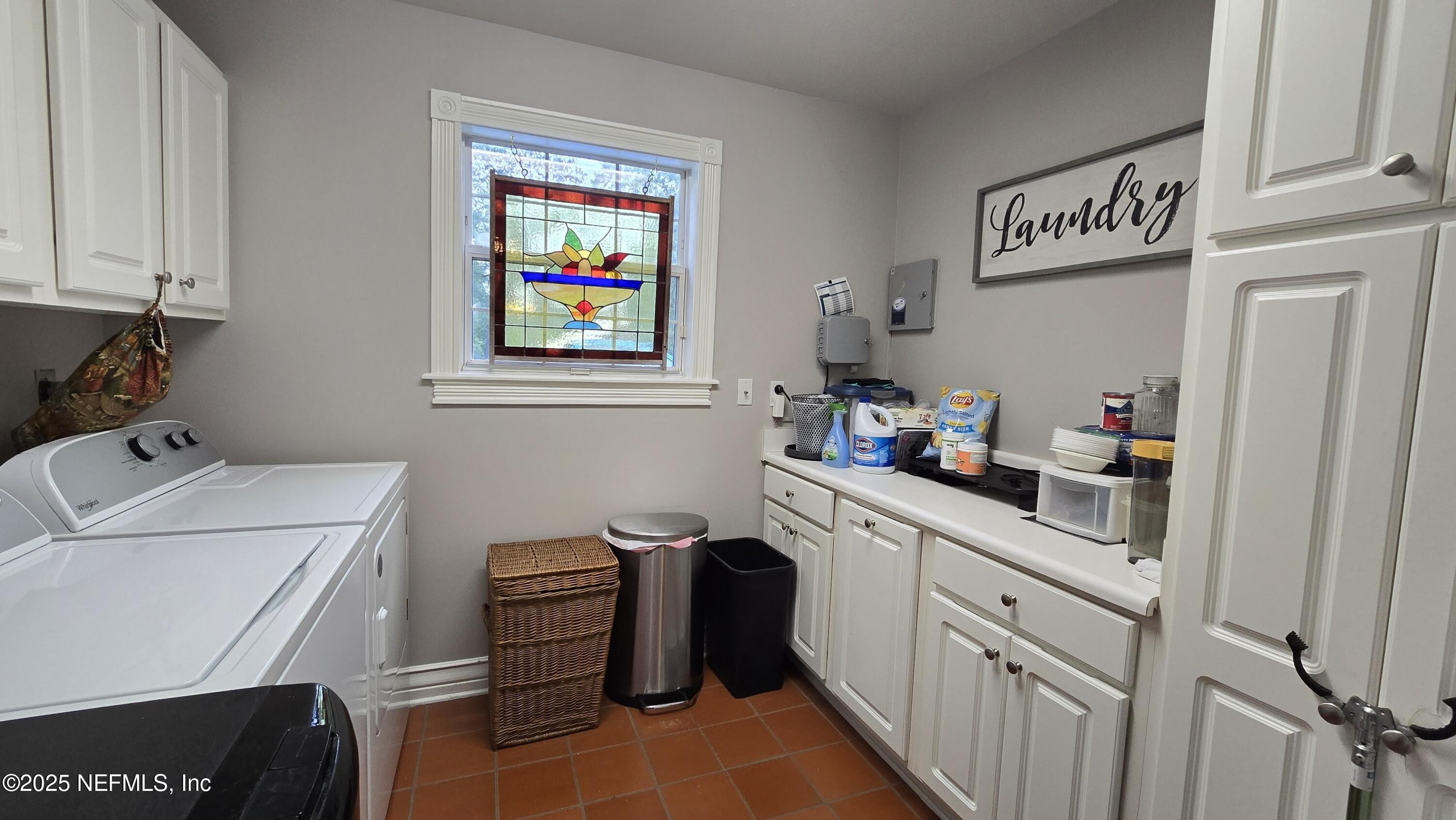 12984 92nd Street Live Oak, FL 32060 - Photo 25 of 32 a kitchen with a cabinets and a stove top oven