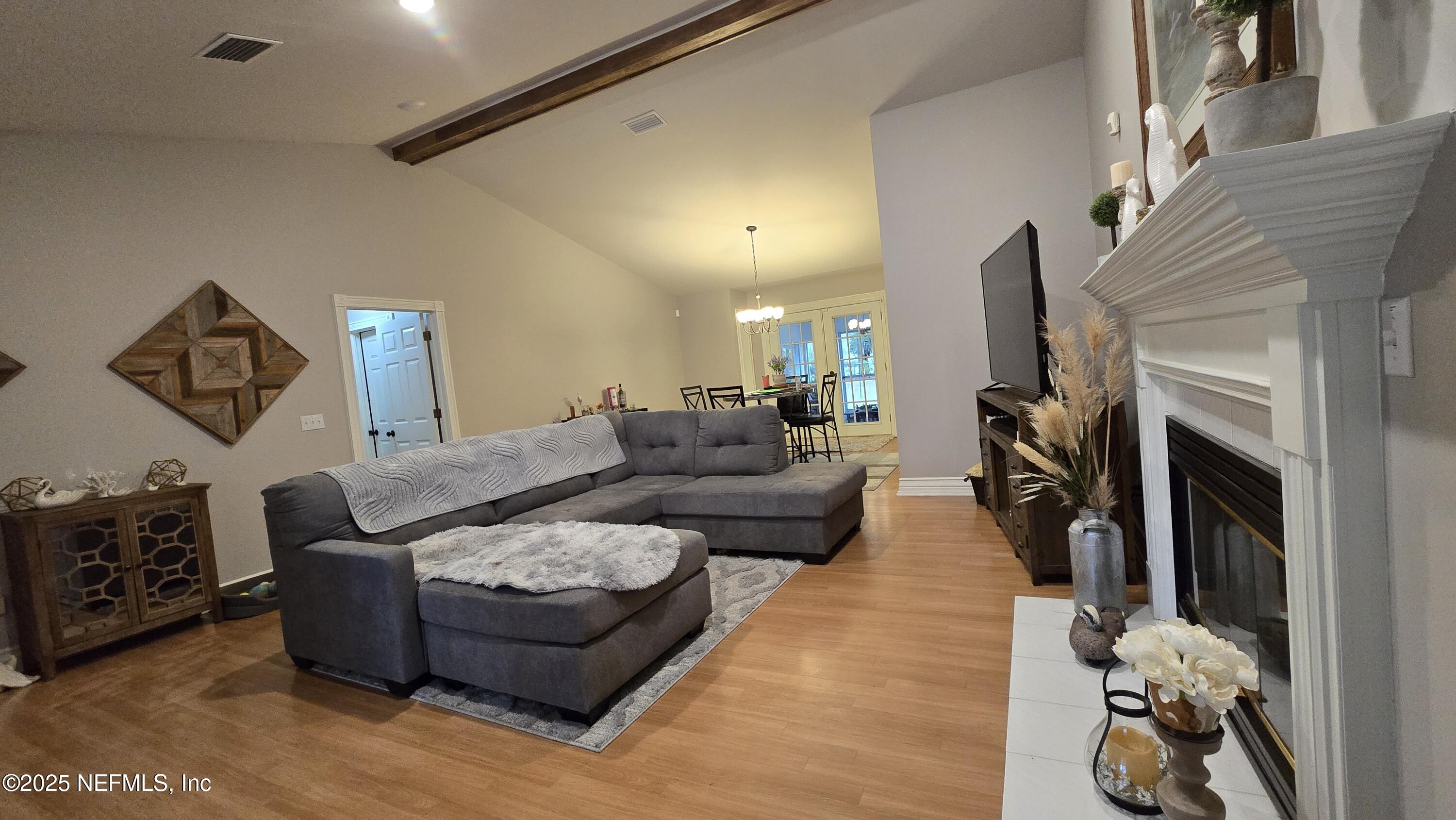 12984 92nd Street Live Oak, FL 32060 - Photo 6 of 32 a living room with furniture and a fireplace