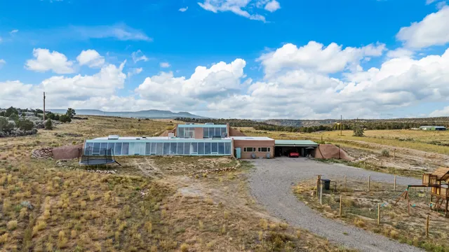 a view of a lake with a building in the background