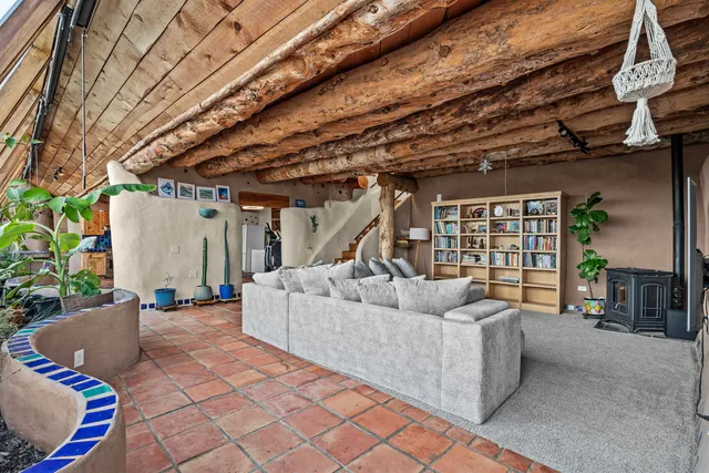 a living room with furniture and a couch