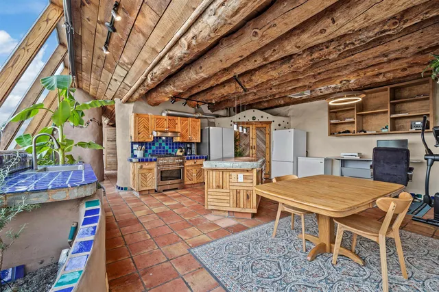 a outdoor dining space with furniture