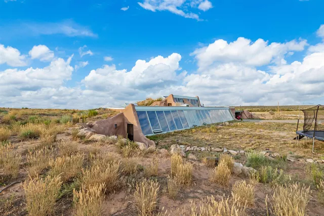 a view of a houses with a yard
