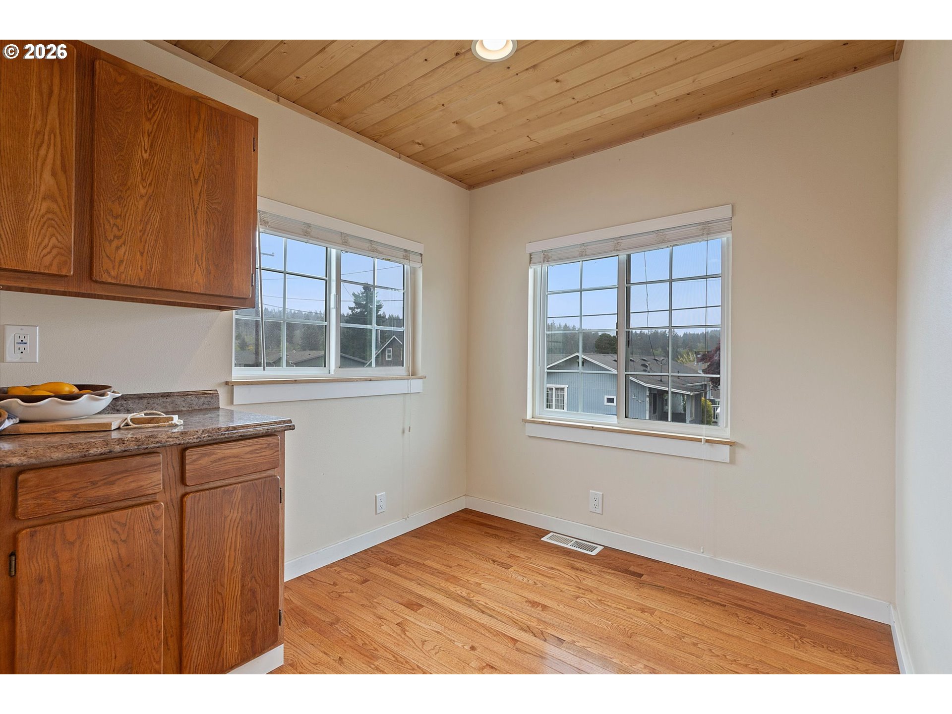 5093 Northeast 49th Street Neotsu, OR 97364 - Photo 12 of 36 a kitchen that has a microwave oven on it and a sink
