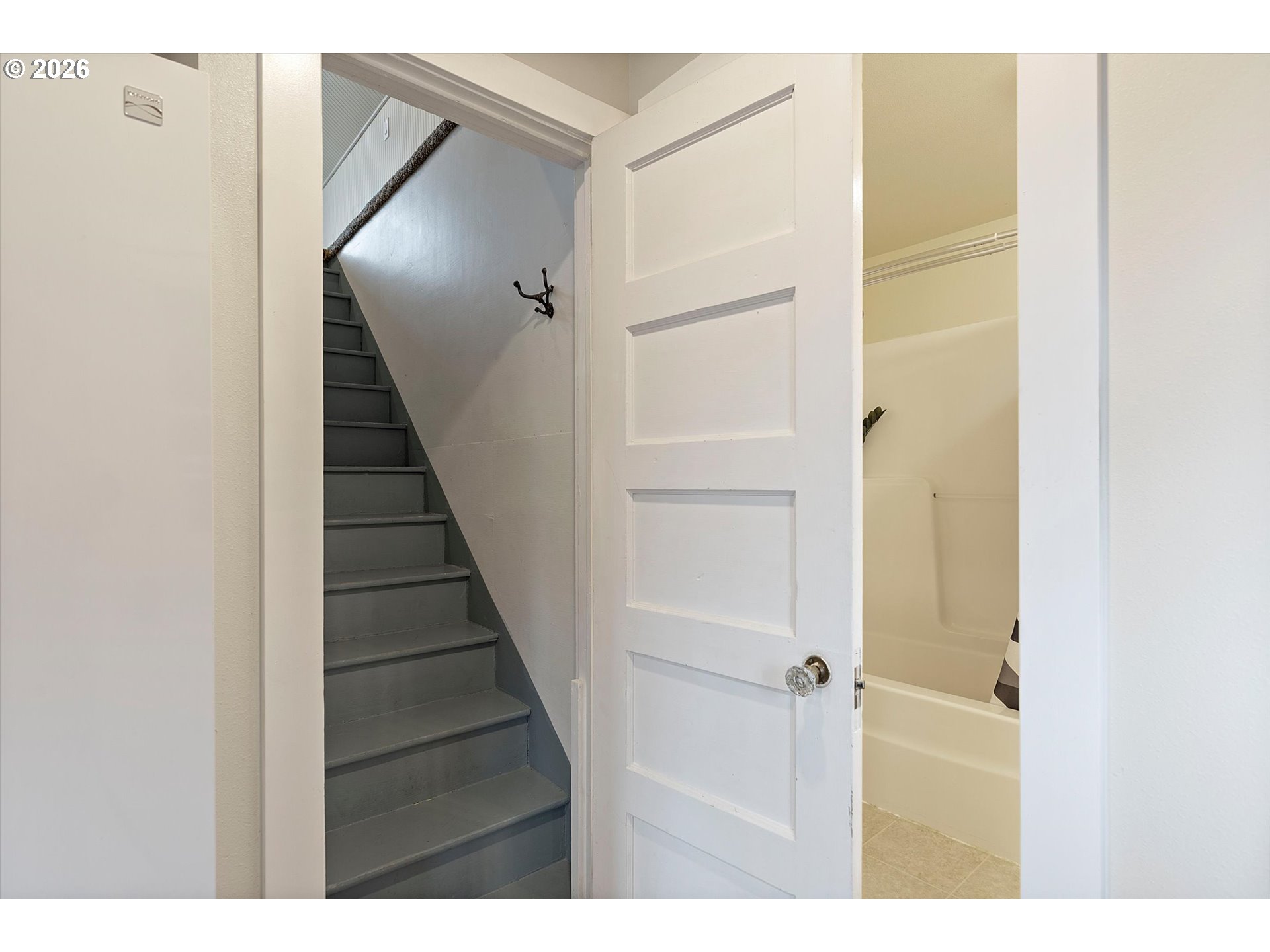 5093 Northeast 49th Street Neotsu, OR 97364 - Photo 17 of 36 a view of a hallway with wooden floor and entryway