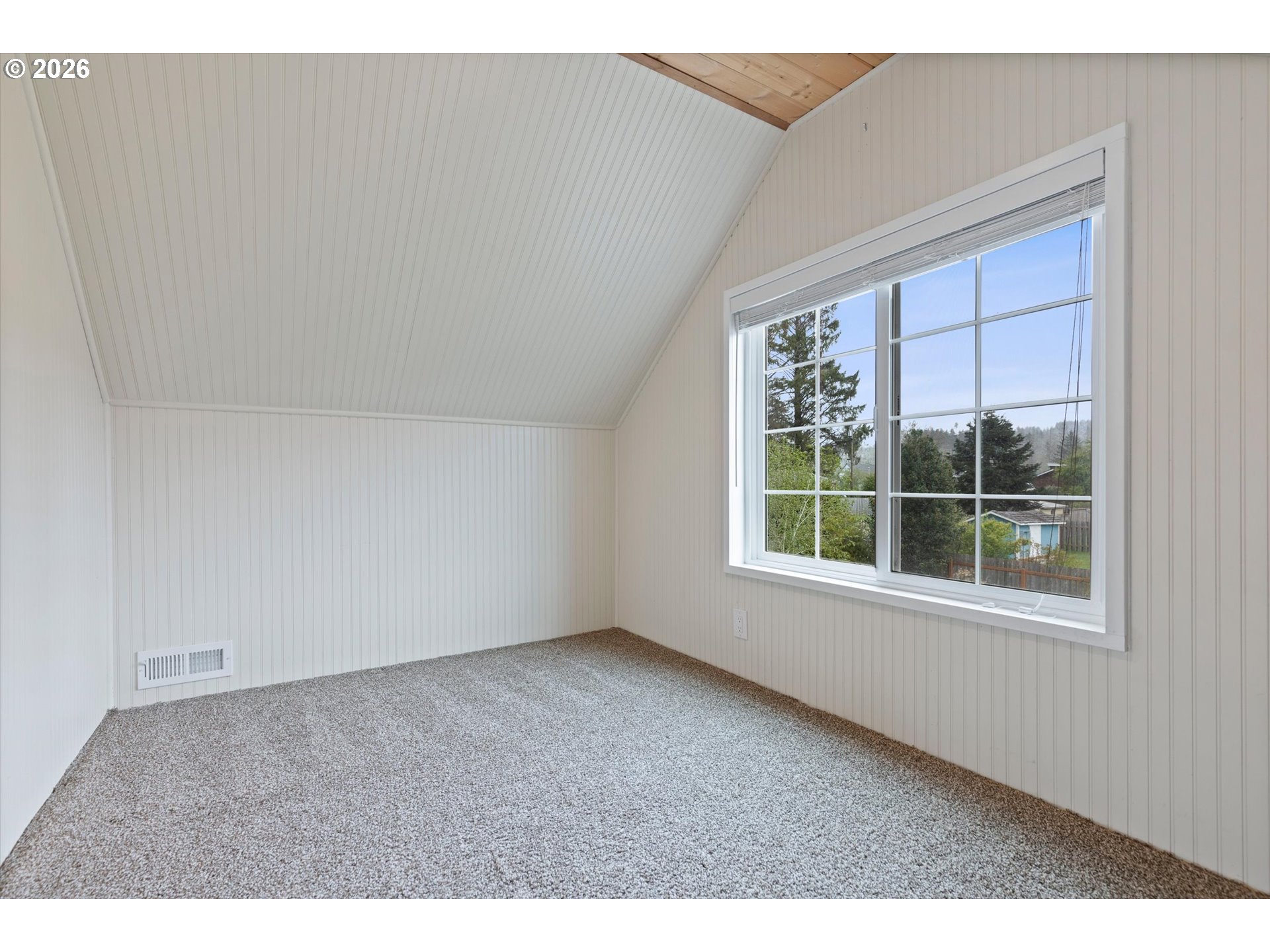 5093 Northeast 49th Street Neotsu, OR 97364 - Photo 20 of 36 an empty room with a window