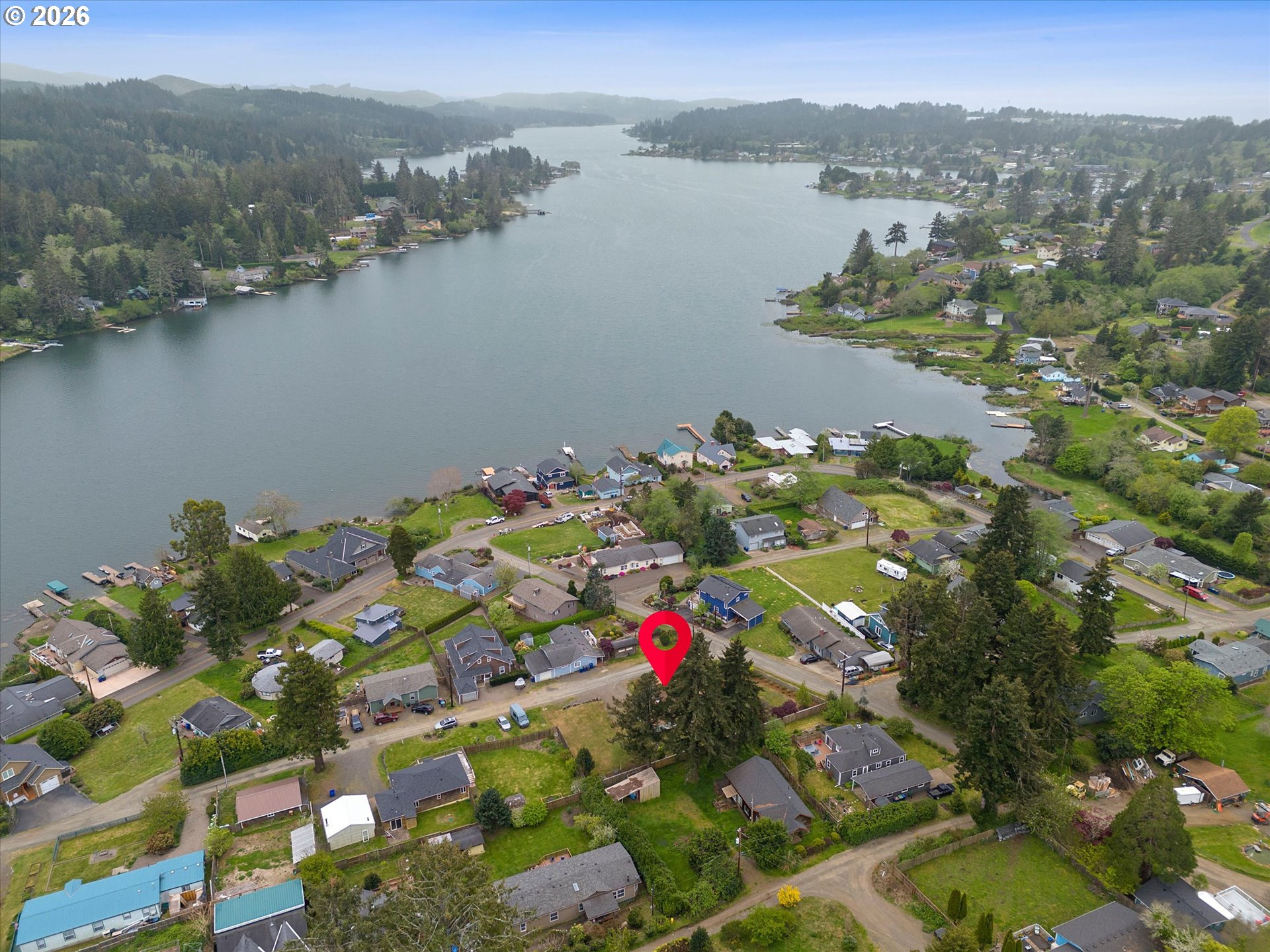 5093 Northeast 49th Street Neotsu, OR 97364 - Photo 2 of 36 a view of lake