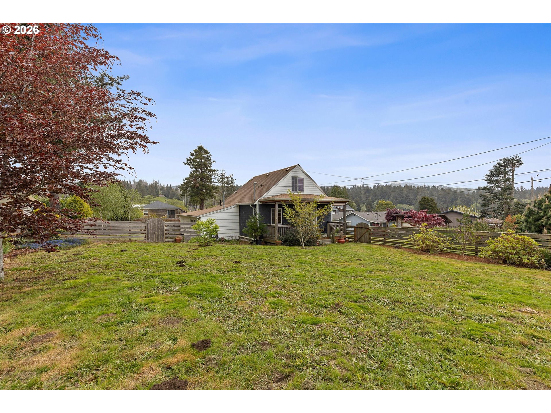 5093 Northeast 49th Street Neotsu, OR 97364 - Photo 25 of 36 a house view with a ocean view