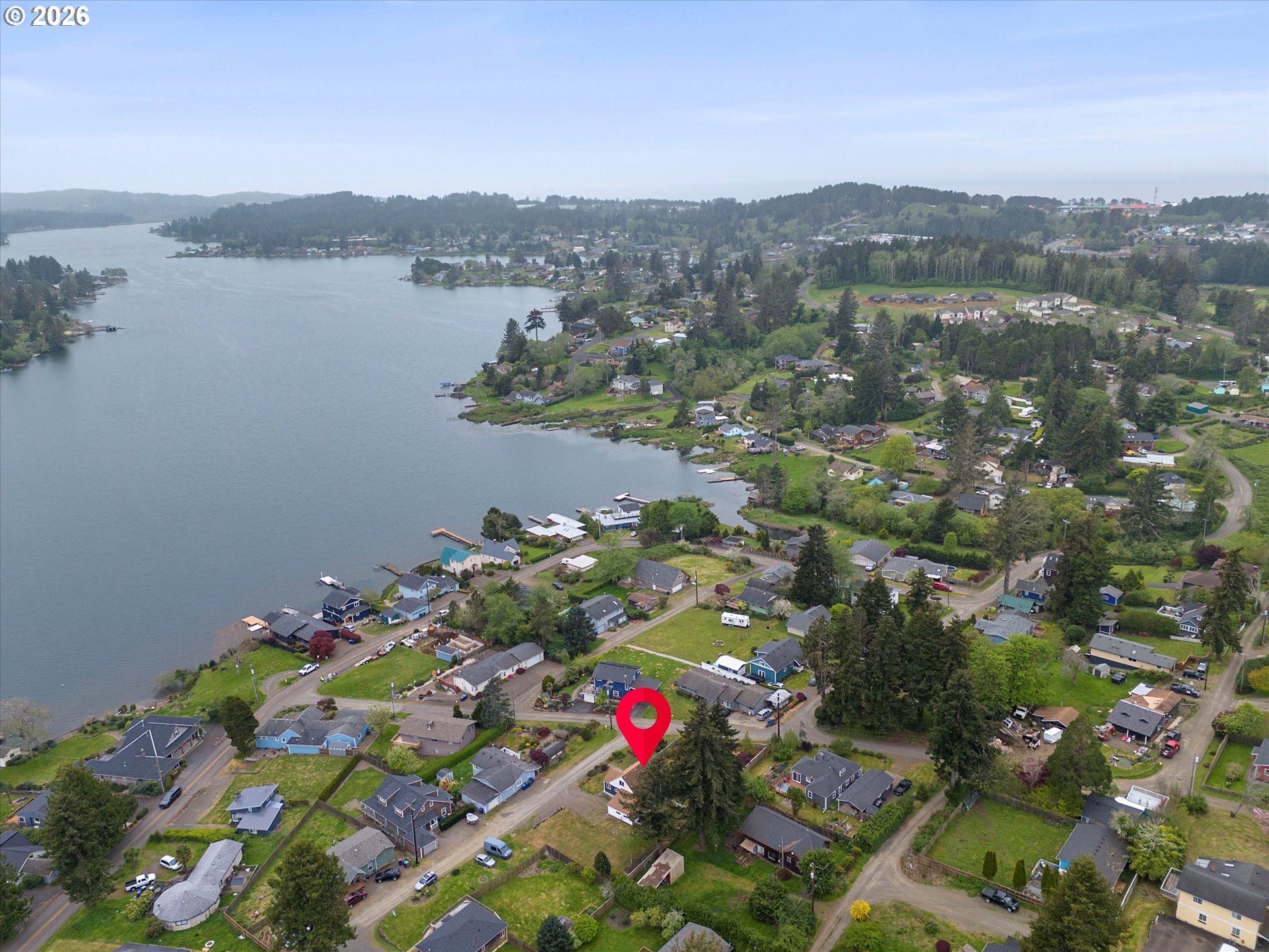 5093 Northeast 49th Street Neotsu, OR 97364 - Photo 4 of 36 a view of lake with mountain