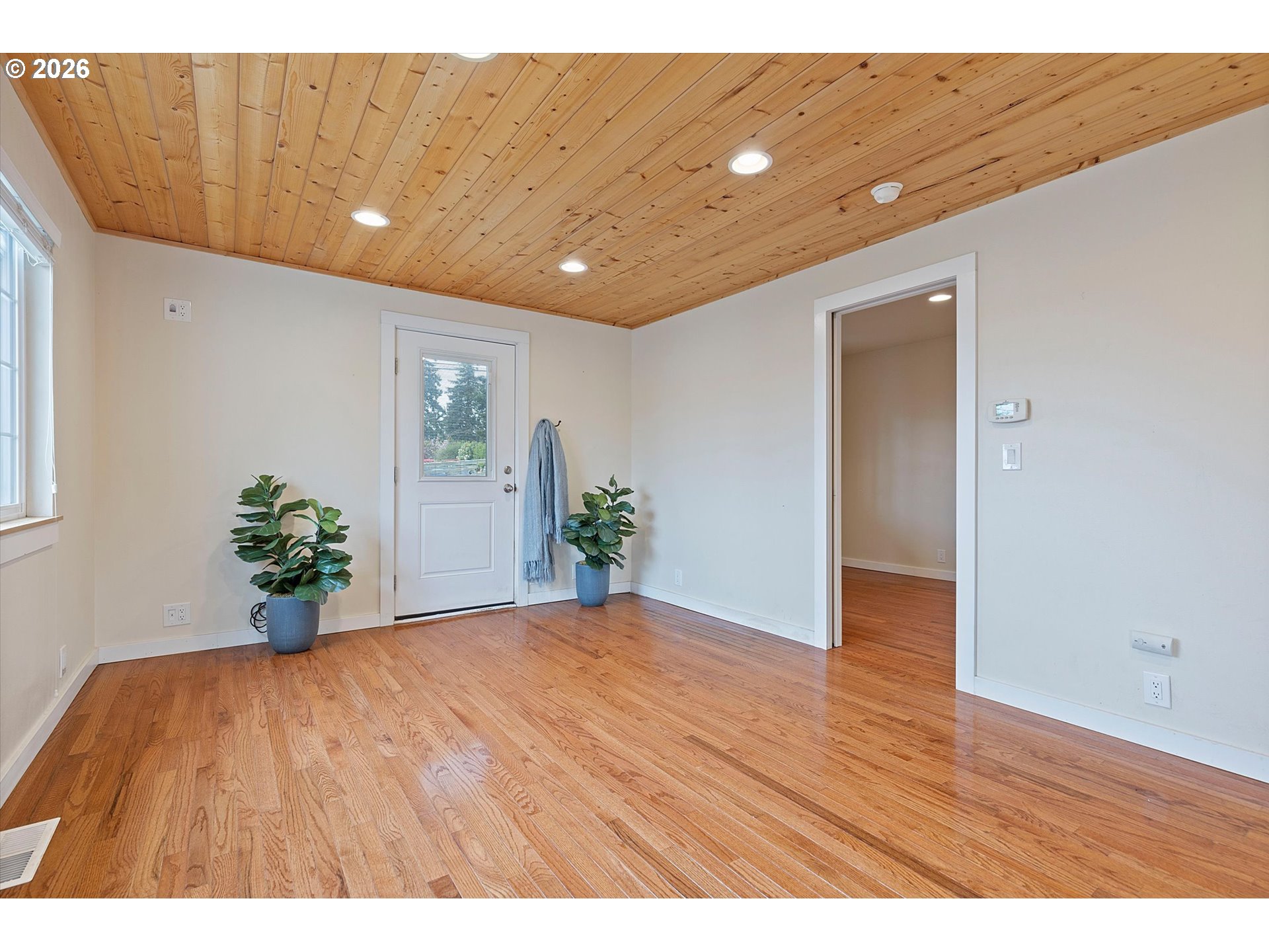 5093 Northeast 49th Street Neotsu, OR 97364 - Photo 6 of 36 a view of an empty room with potted plant