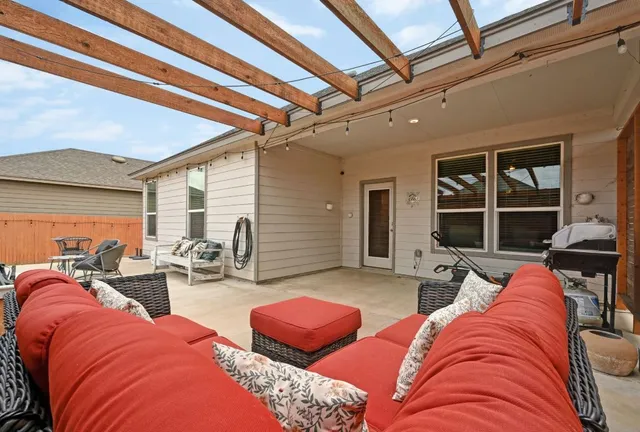 a view of an outdoor space with lounge chair