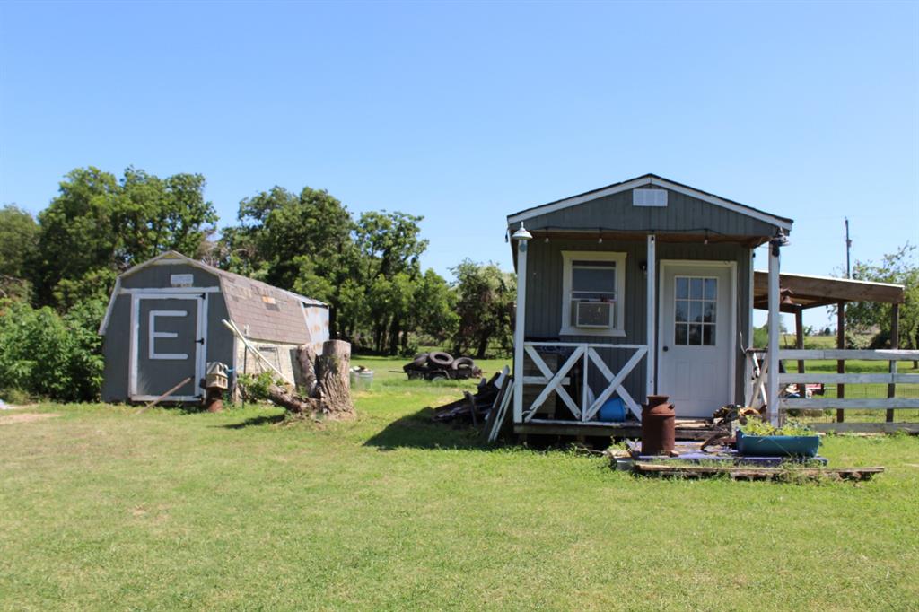118 Rommel Court Springtown, TX 76082 - Photo 14 of 17 storage shed