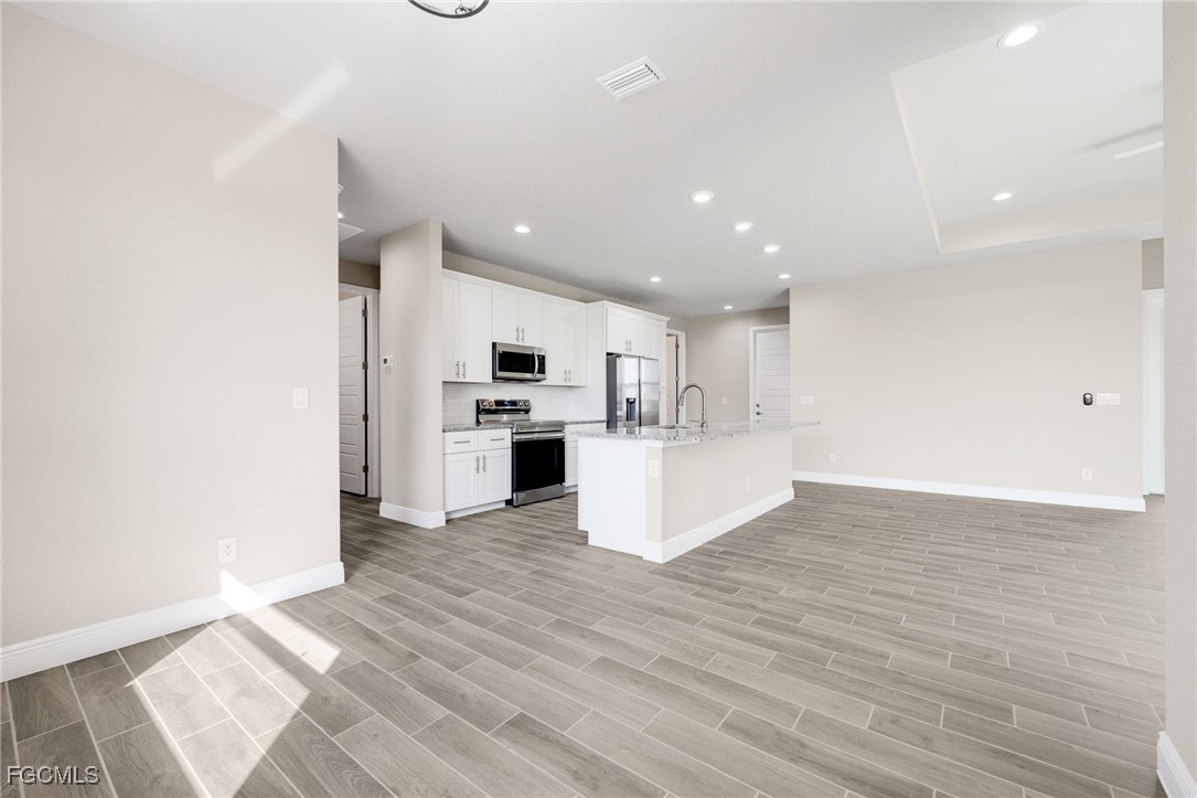 1346 Radio Loop LaBelle, FL 33935 - Photo 15 of 27 a view of kitchen with wooden floor