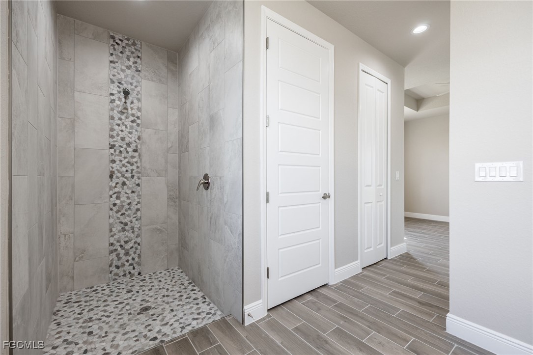 1346 Radio Loop LaBelle, FL 33935 - Photo 24 of 27 a bathroom with a shower