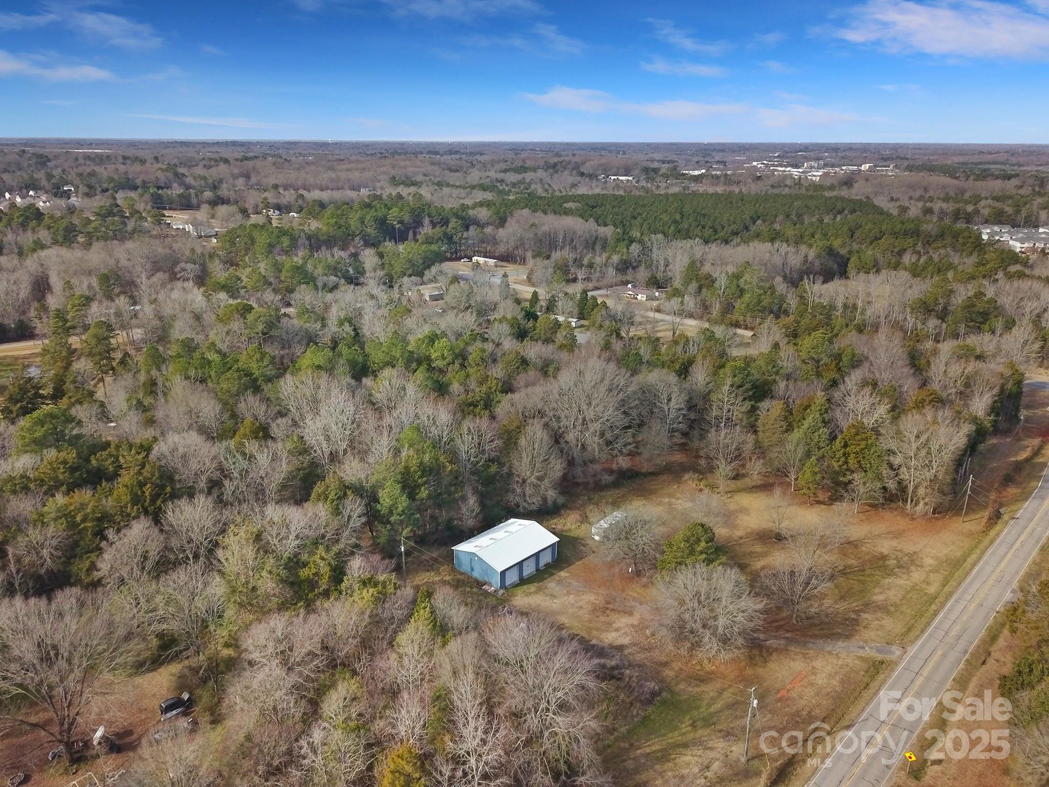 1255 Church Road Rock Hill, SC 29730 - Photo 4 of 9 a view of a dry yard with large trees