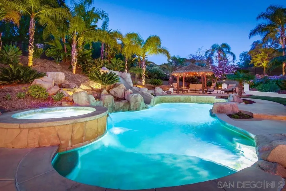 14399 Blue Sage Road Poway, CA 92064 - Photo 3 of 70 a view of a swimming pool in a backyard
