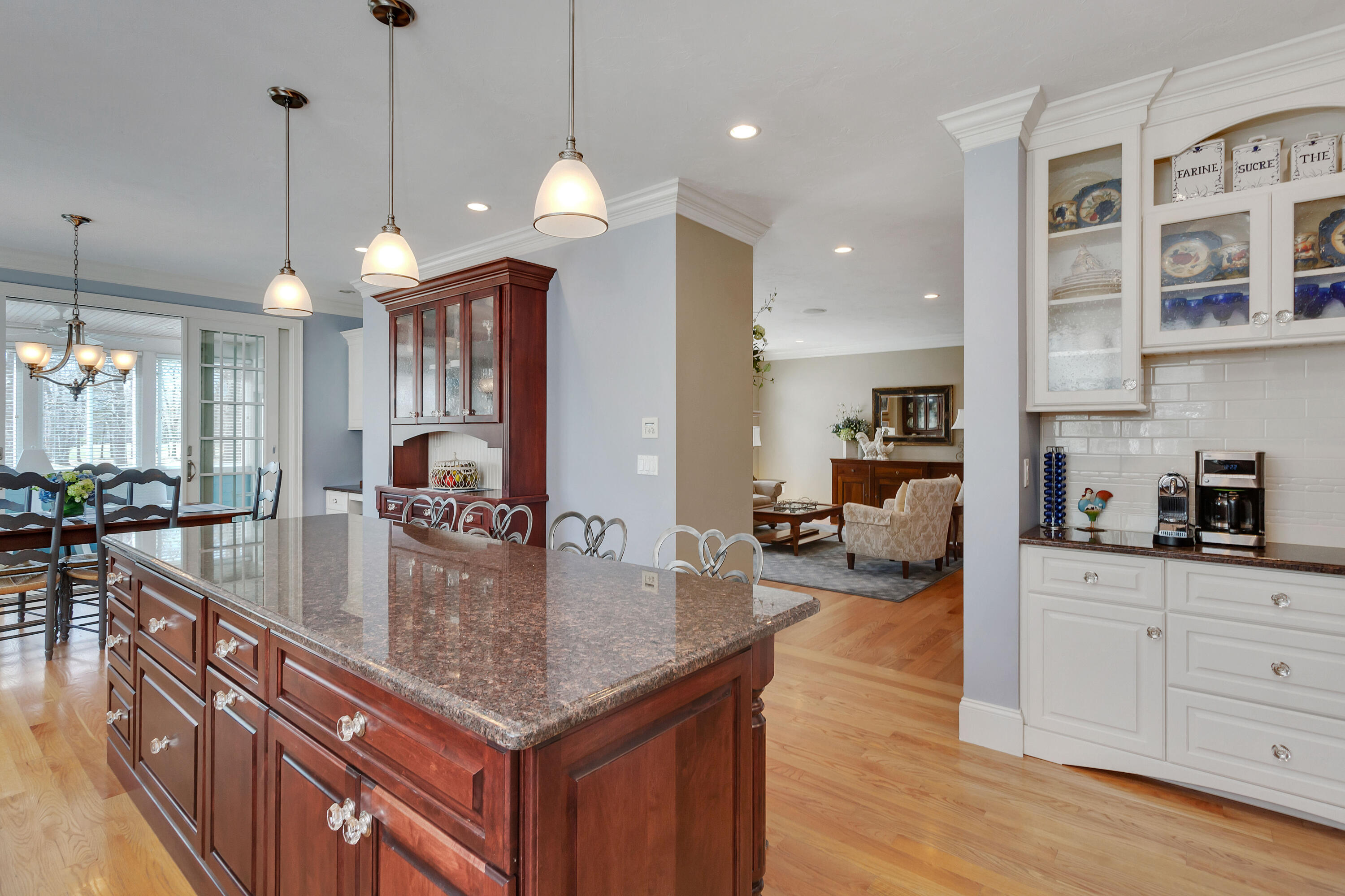 10 Open Space Drive Sandwich, MA 02563 - Photo 16 of 49 a kitchen with stainless steel appliances granite countertop a sink a stove and a wooden floors