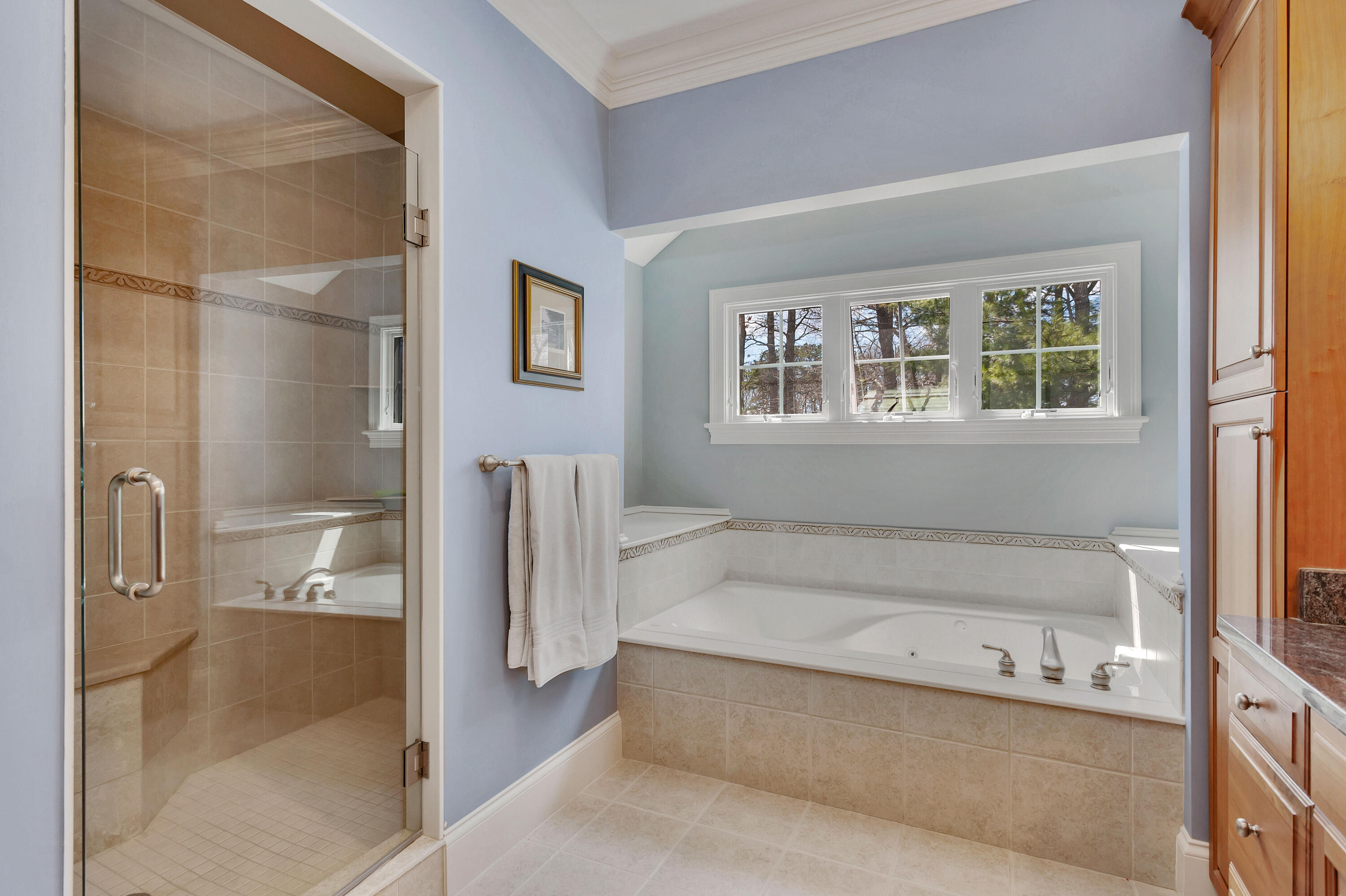 10 Open Space Drive Sandwich, MA 02563 - Photo 23 of 49 a bathroom with a bathtub and a shower