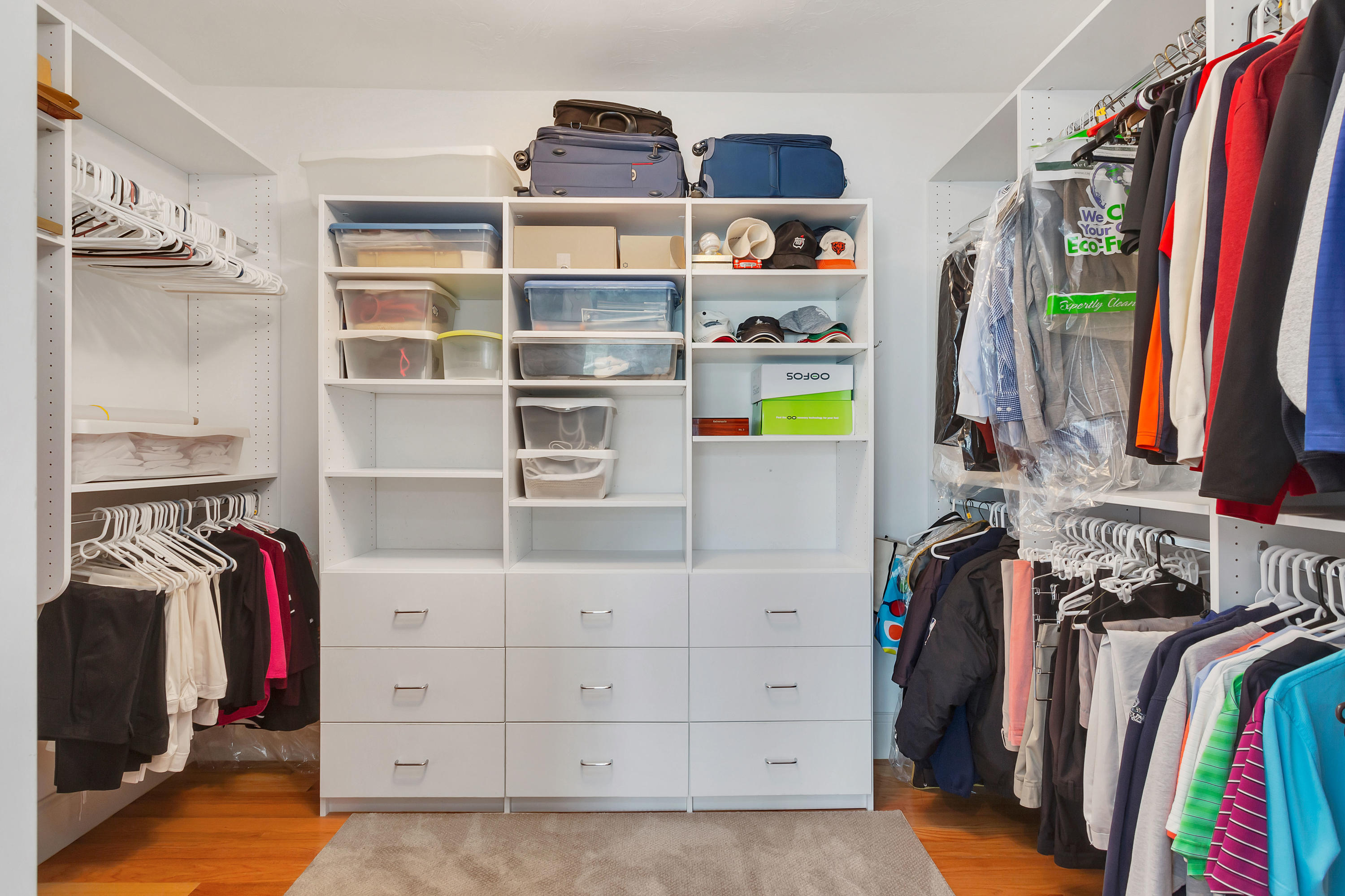 10 Open Space Drive Sandwich, MA 02563 - Photo 26 of 49 a view of walk in closet with clothes and shoes