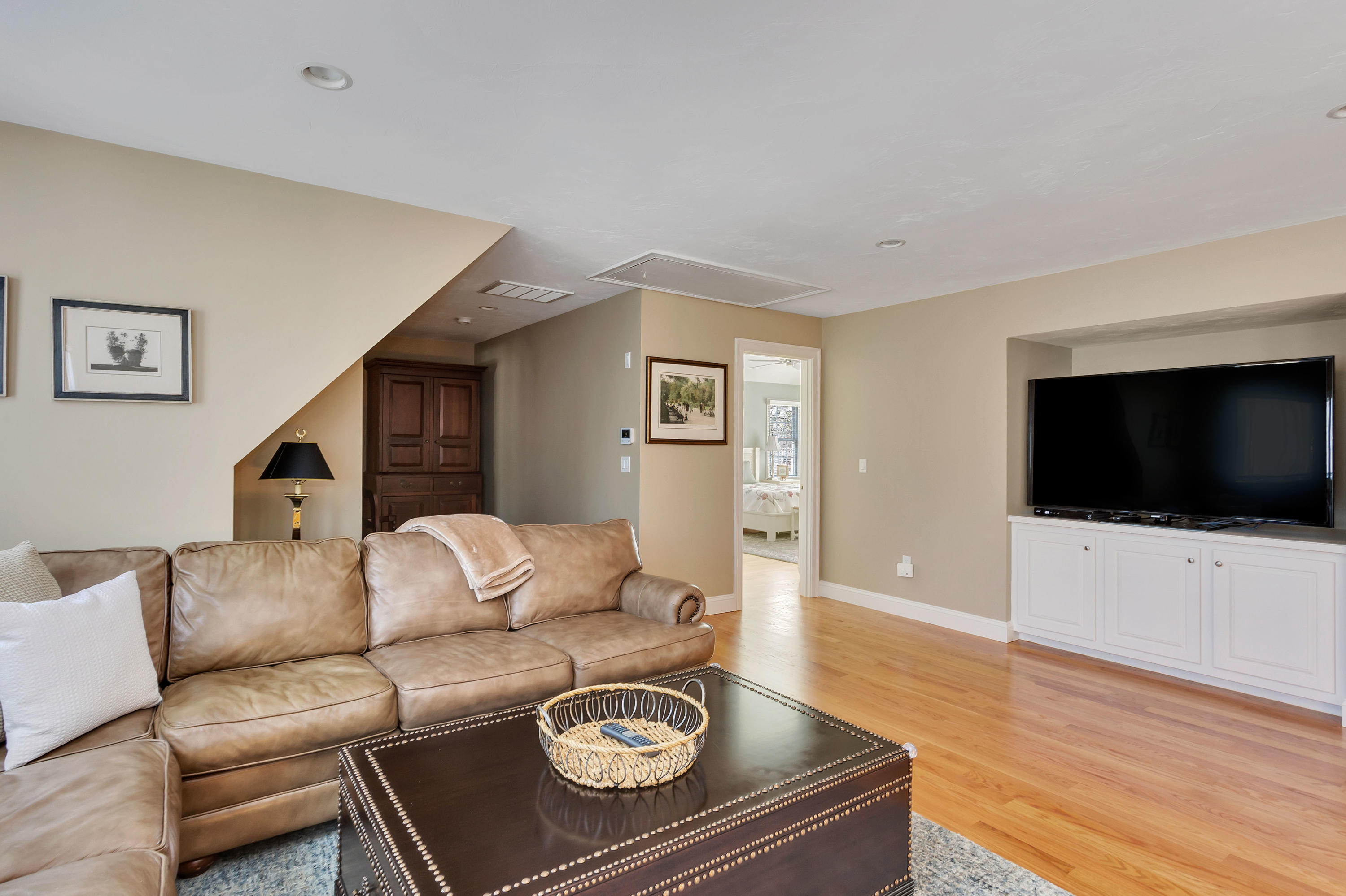 10 Open Space Drive Sandwich, MA 02563 - Photo 28 of 49 a living room with furniture and a flat screen tv