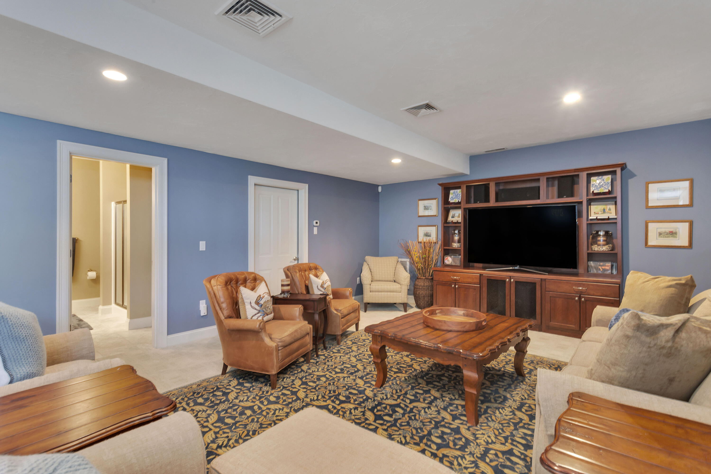 10 Open Space Drive Sandwich, MA 02563 - Photo 38 of 49 a living room with furniture and a flat screen tv