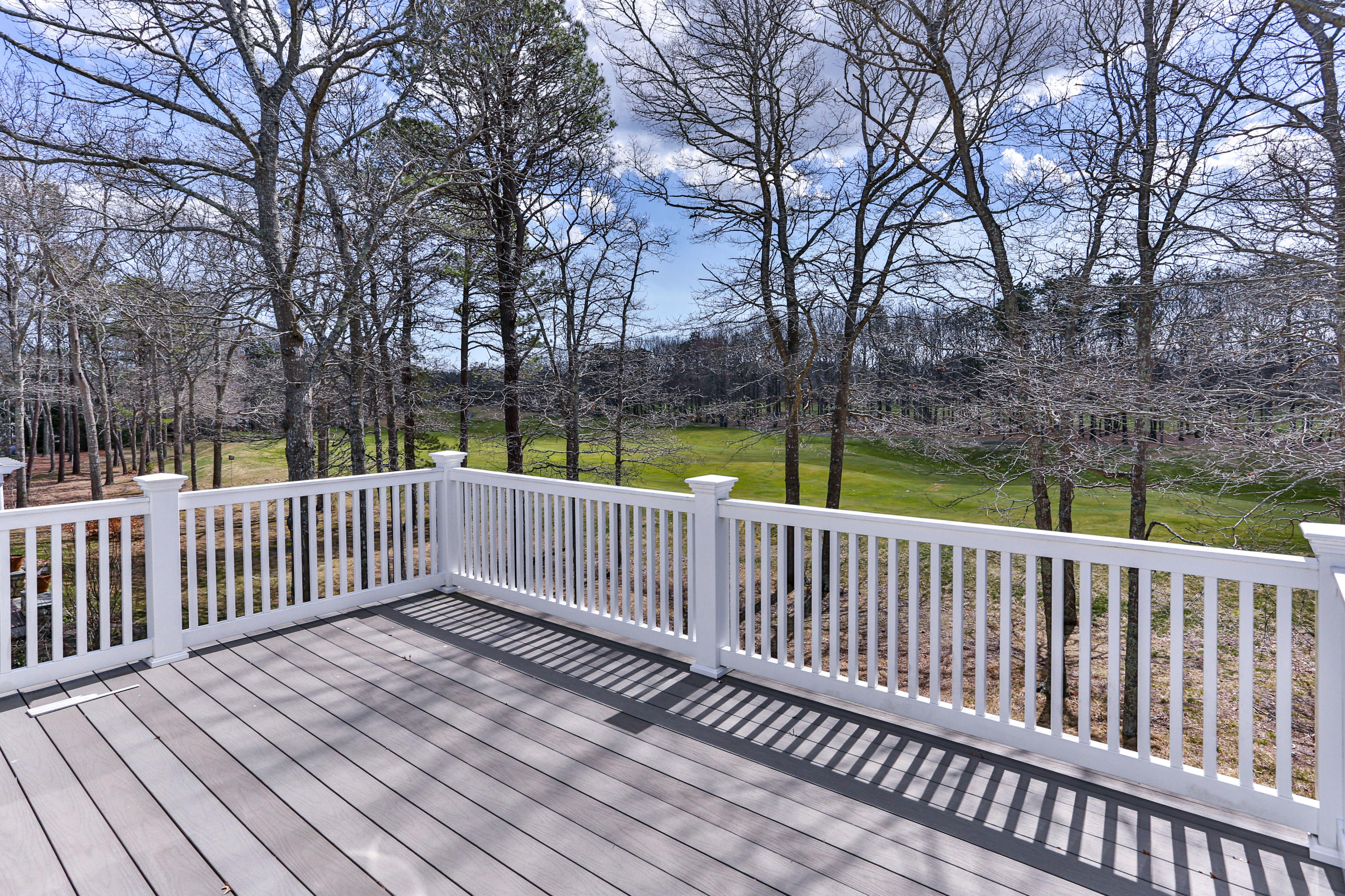 10 Open Space Drive Sandwich, MA 02563 - Photo 41 of 49 a view of a wooden roof deck