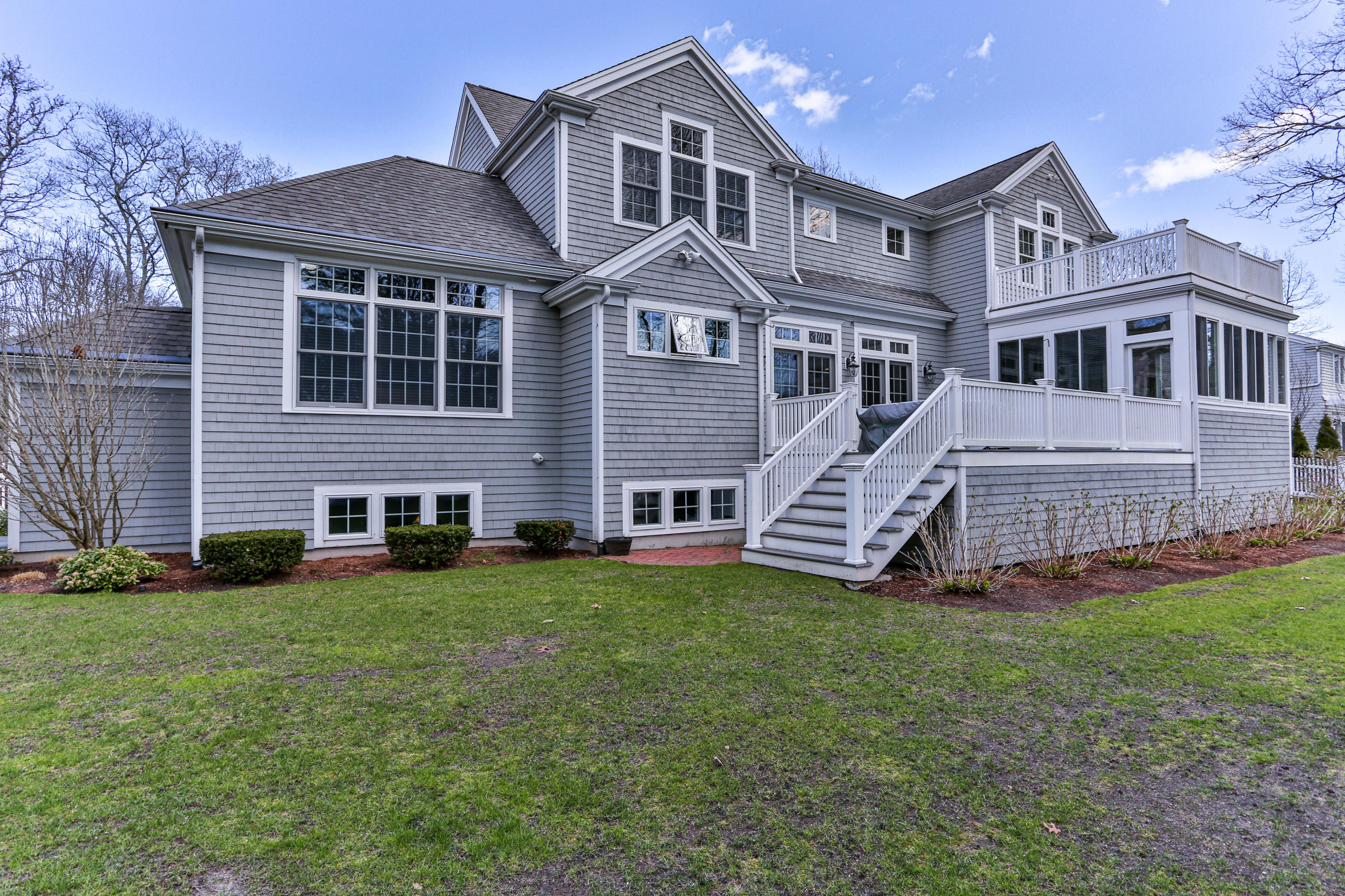 10 Open Space Drive Sandwich, MA 02563 - Photo 42 of 49 a front view of a house with a yard