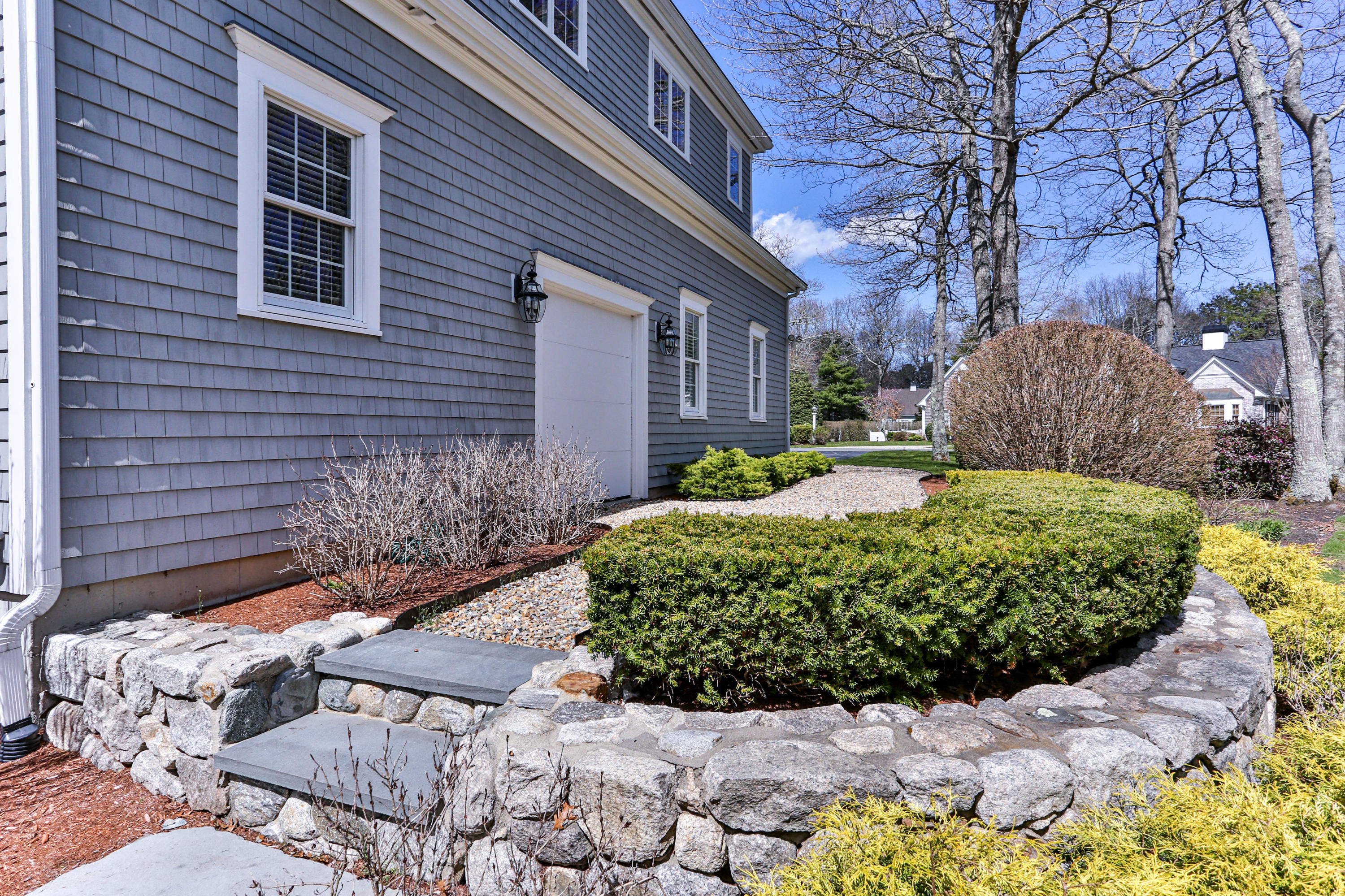10 Open Space Drive Sandwich, MA 02563 - Photo 44 of 49 a front view of a house with a yard