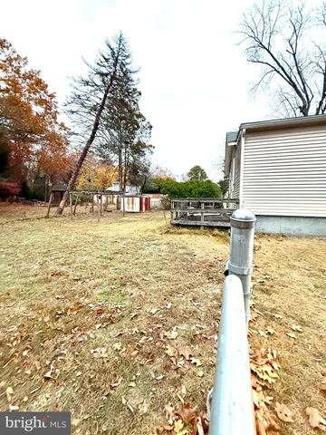 a view of swimming pool with outdoor space and seating area