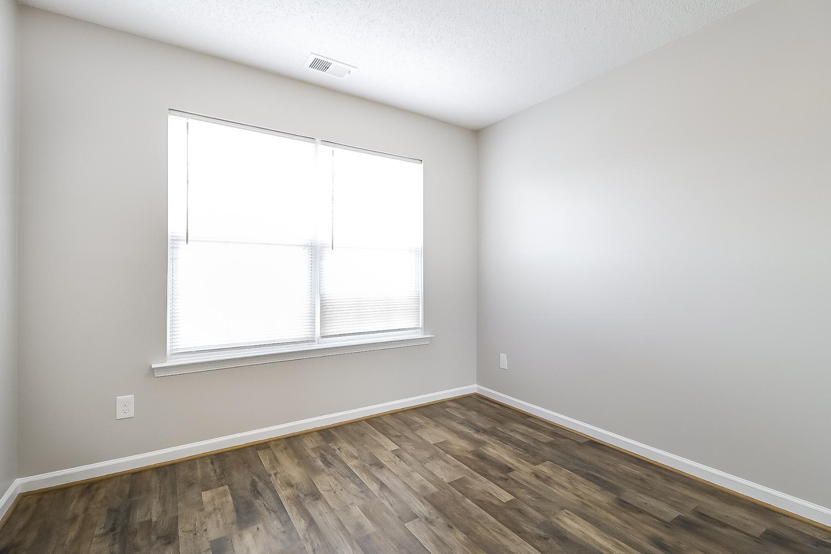 5900 Wessel Way Raleigh, NC 27610 - Photo 12 of 17 an empty room with a window