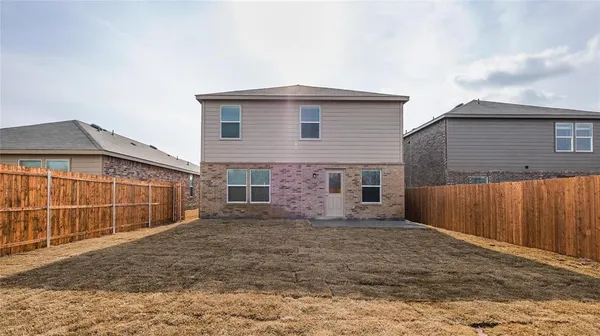 a view of backyard of house