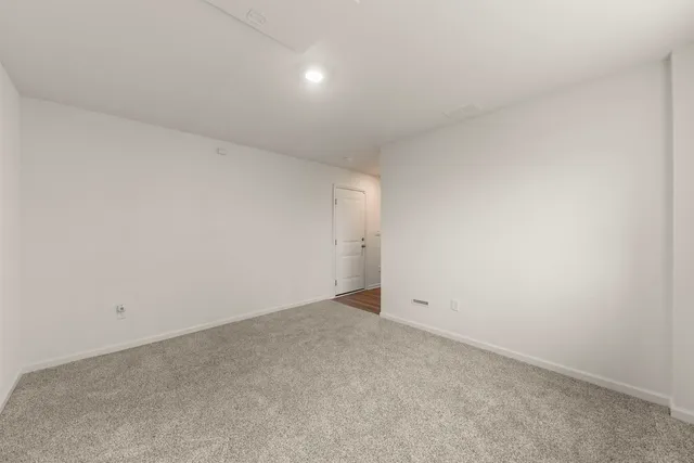an empty room with an entryway