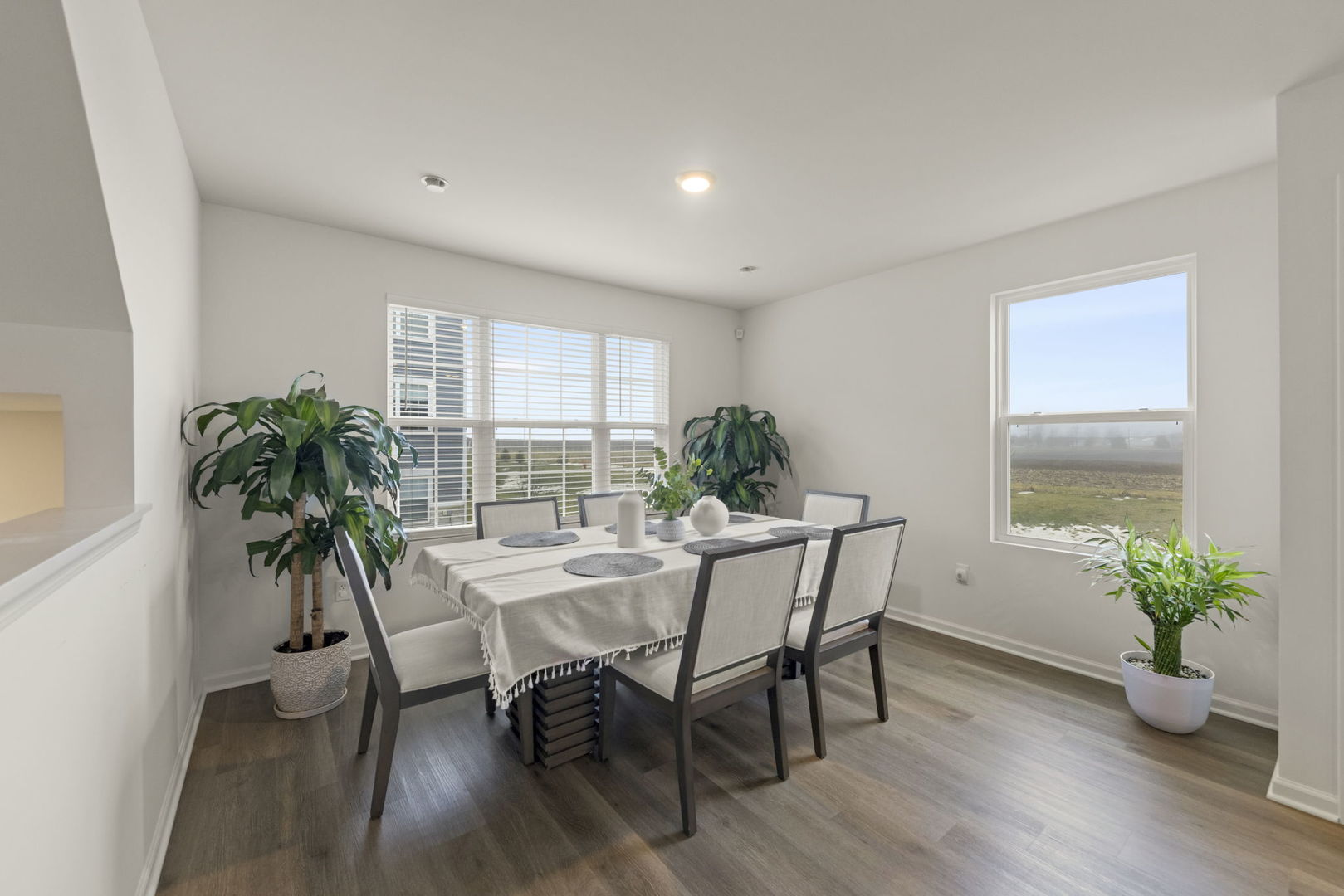 1561 Sequoia Way Pingree Grove, IL 60140 - Photo 2 of 25 a view of a dining room with furniture window and wooden floor