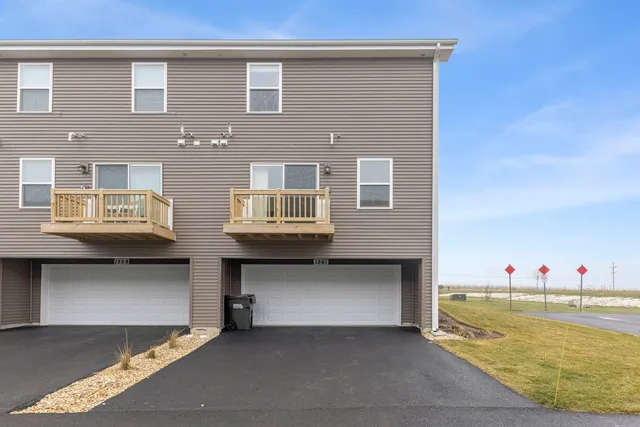 a front view of house with yard