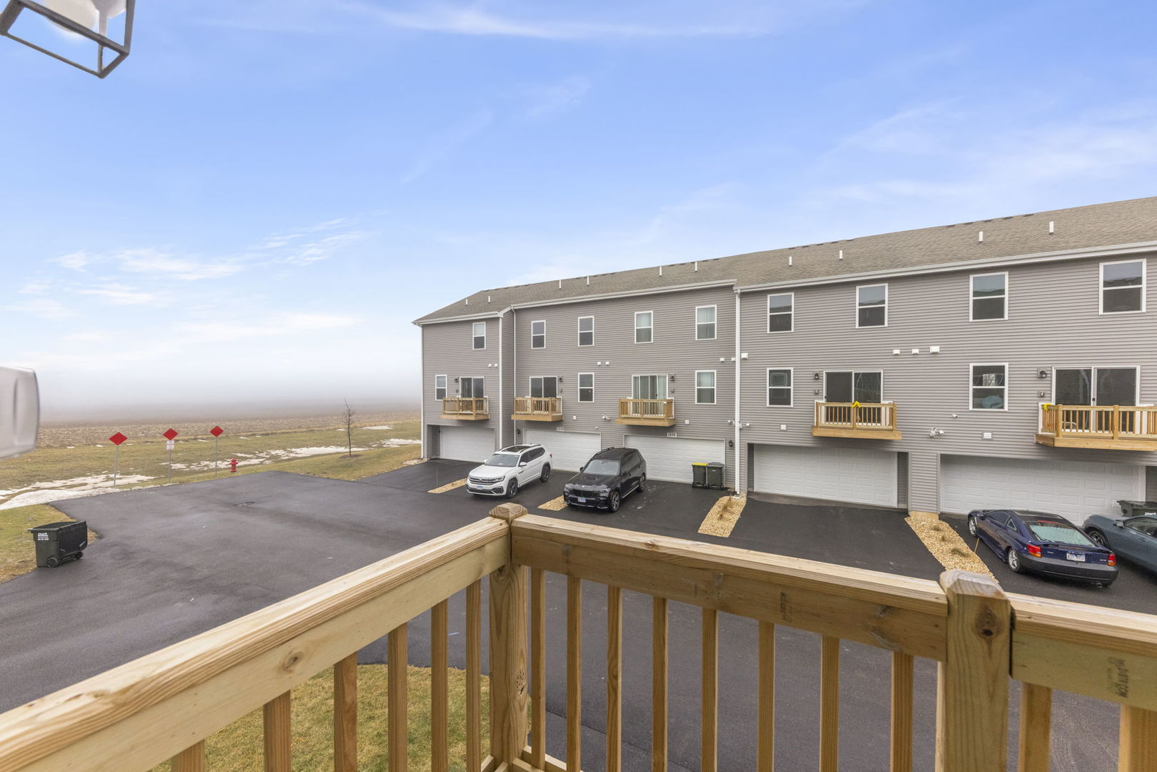 1561 Sequoia Way Pingree Grove, IL 60140 - Photo 10 of 25 a view of a balcony with many windows