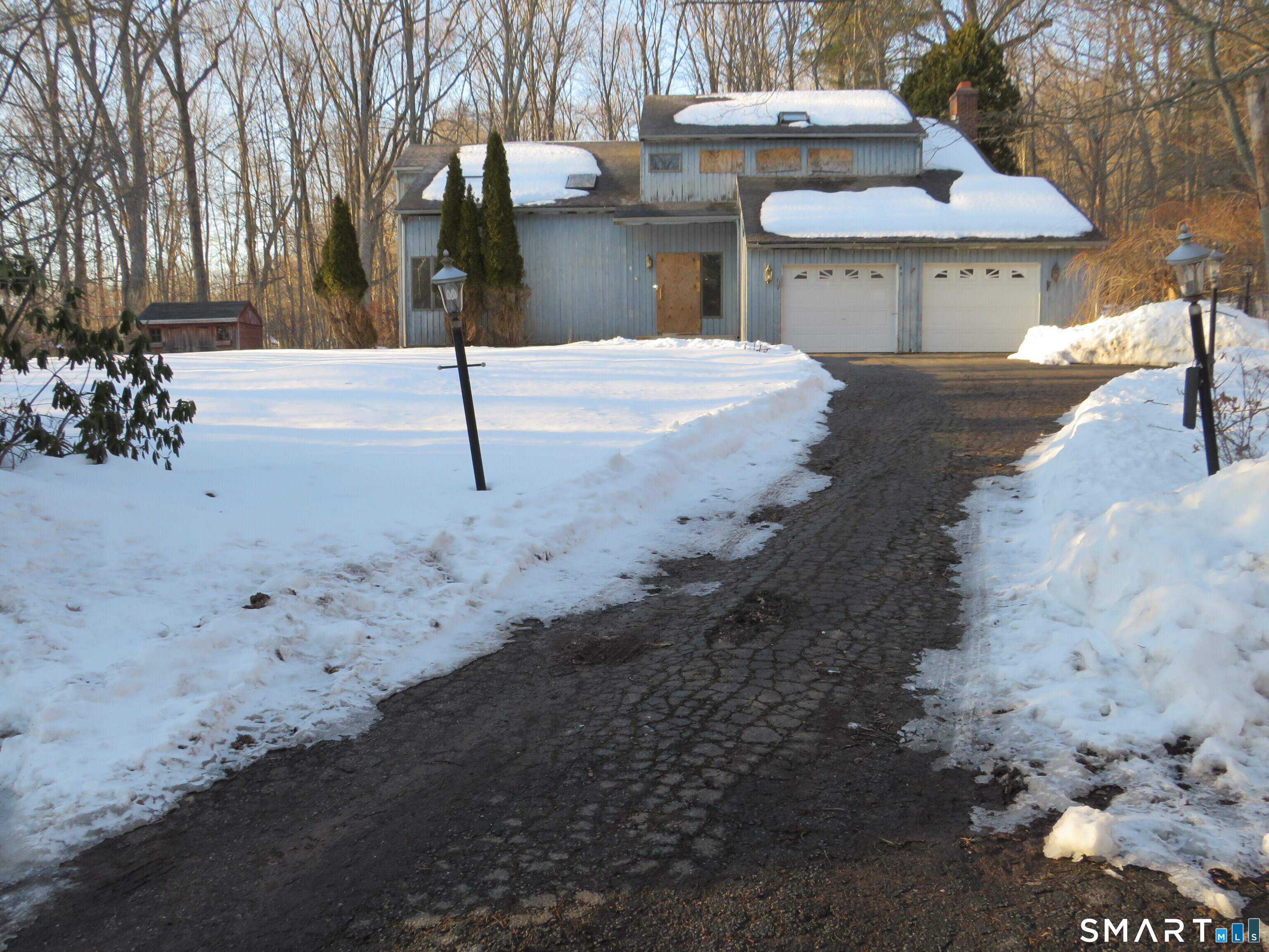 45 Toll Gate Road Glastonbury, CT 06073 - Photo 1 of 1 a front view of a house with a yard