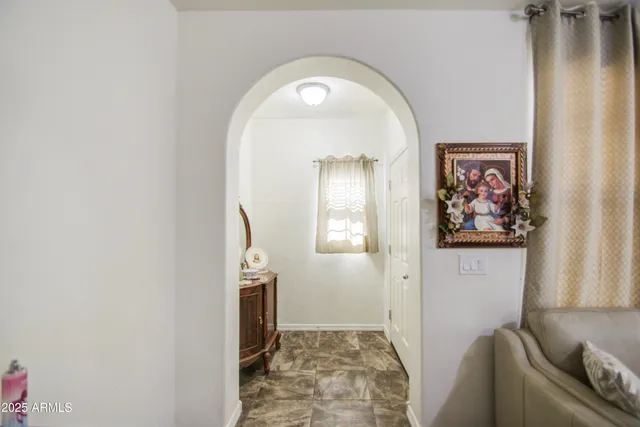 a view of livingroom with furniture and window