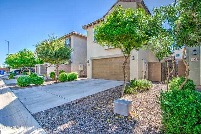 a view of a garage with rack and bicycle