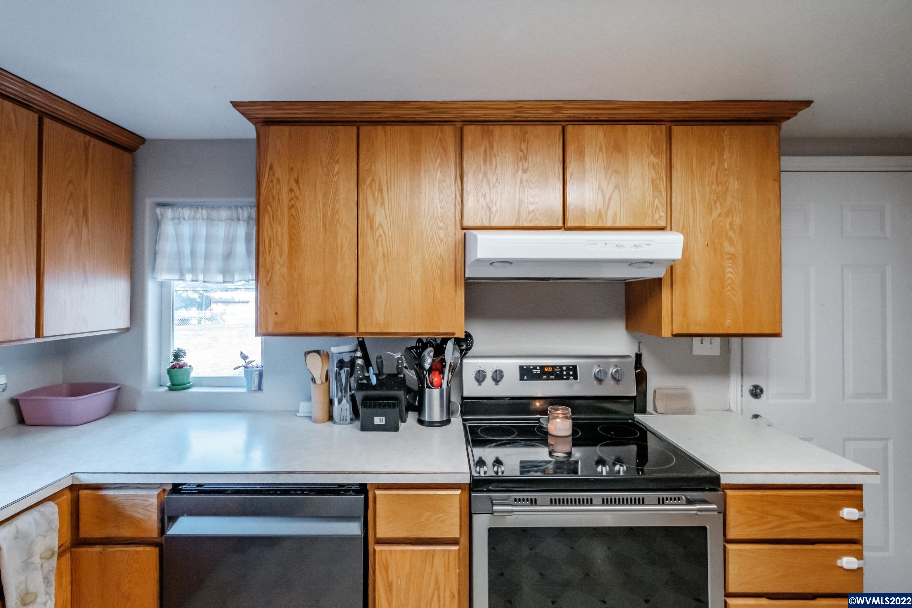 4725 Knox Butte Road East Albany, OR 97322 - Photo 15 of 41 a kitchen with a sink cabinets and appliances