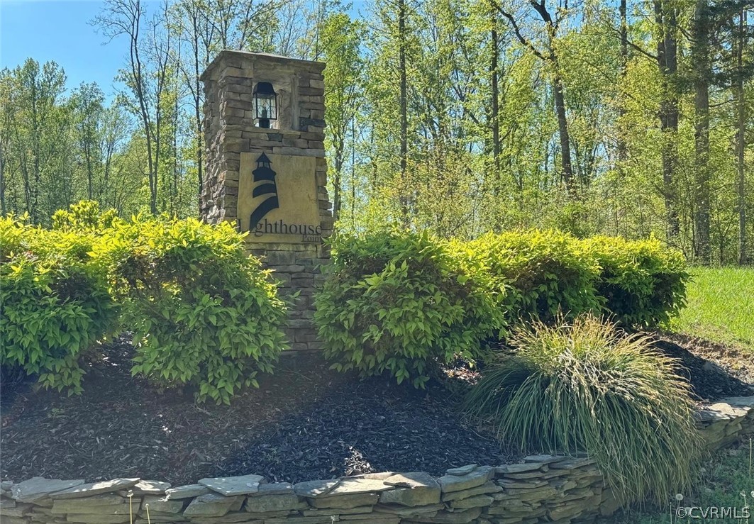 51 Lighthouse Drive Bumpass, VA 23024 - Photo 23 of 23 a backyard of a building with lots of green space
