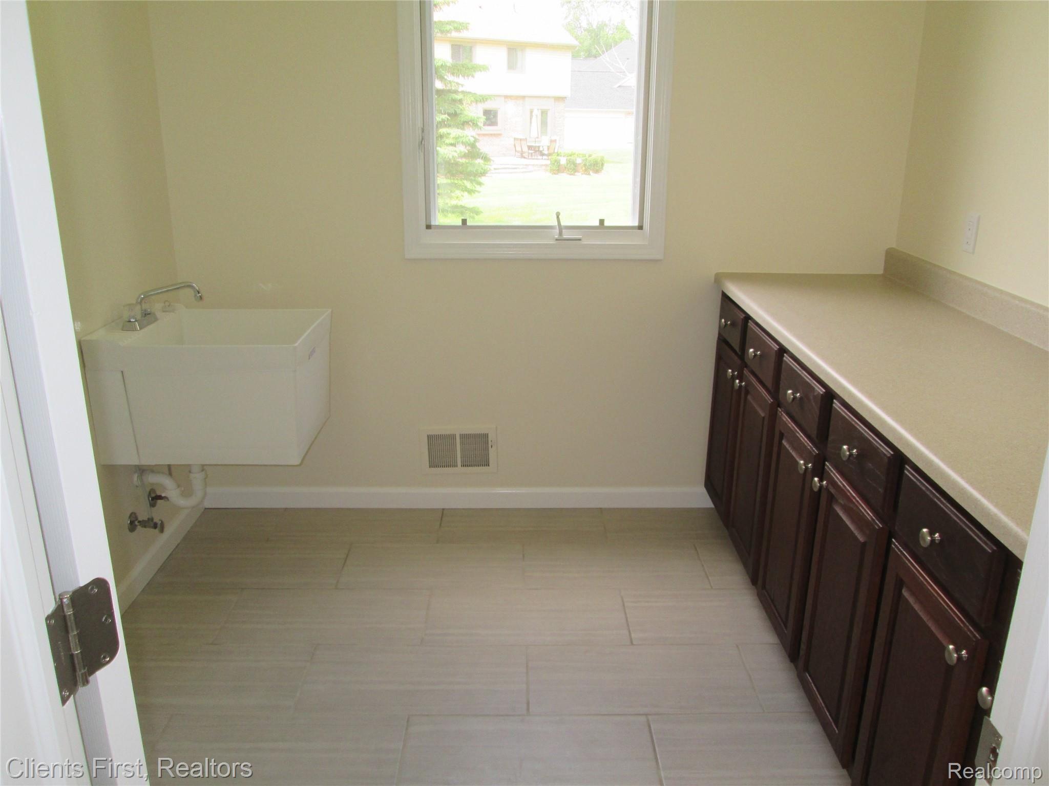 46822 Balboa Road Canton, MI 48187 - Photo 24 of 26 115 Laundry.JPG