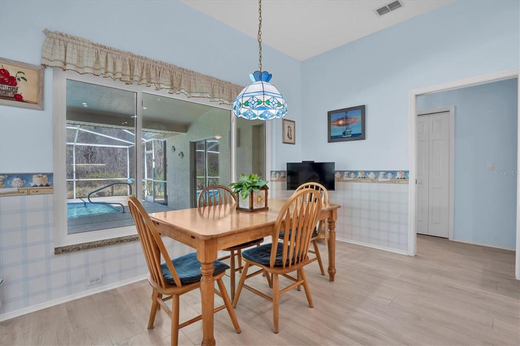 1014 Arlinbrook Drive Trinity, FL 34655 - Photo 18 of 69 a dining room with furniture and window