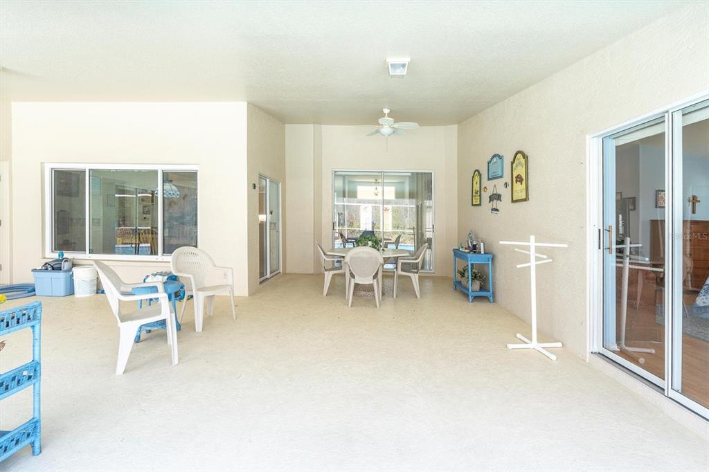 1014 Arlinbrook Drive Trinity, FL 34655 - Photo 34 of 69 a living room with furniture and a large window