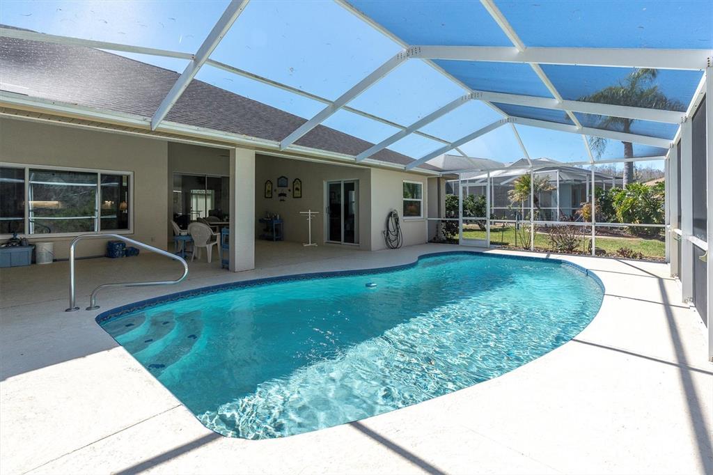 1014 Arlinbrook Drive Trinity, FL 34655 - Photo 37 of 69 a view of a house with backyard porch and sitting area