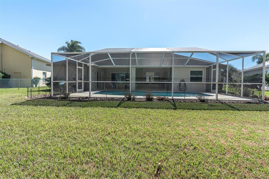 1014 Arlinbrook Drive Trinity, FL 34655 - Photo 40 of 69 a view of a house with a backyard