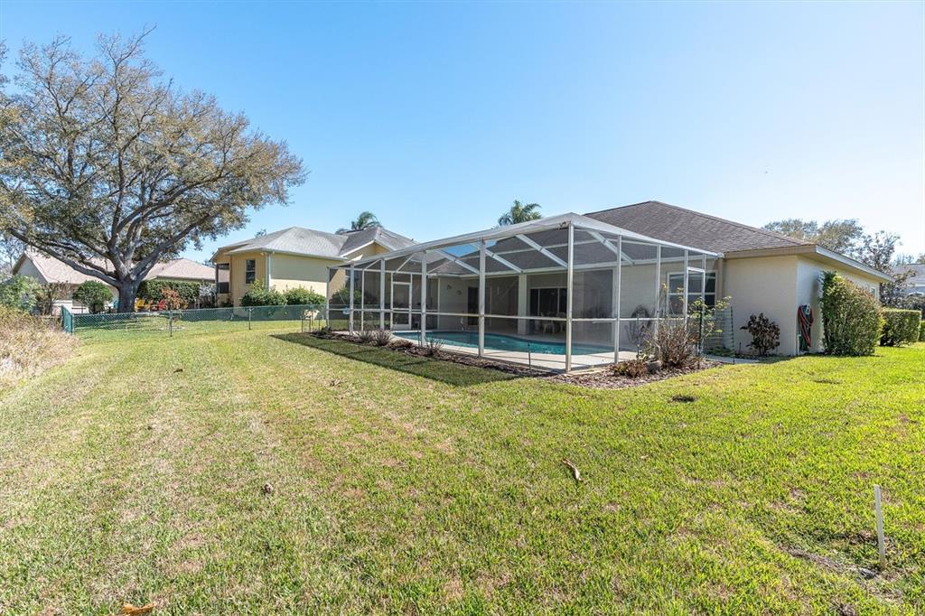 1014 Arlinbrook Drive Trinity, FL 34655 - Photo 41 of 69 a view of a house with a yard and sitting area