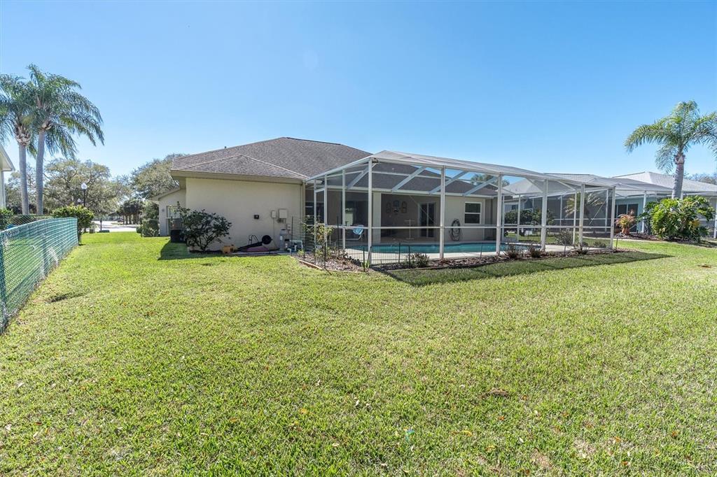 1014 Arlinbrook Drive Trinity, FL 34655 - Photo 42 of 69 a view of a house with a yard patio and swimming pool