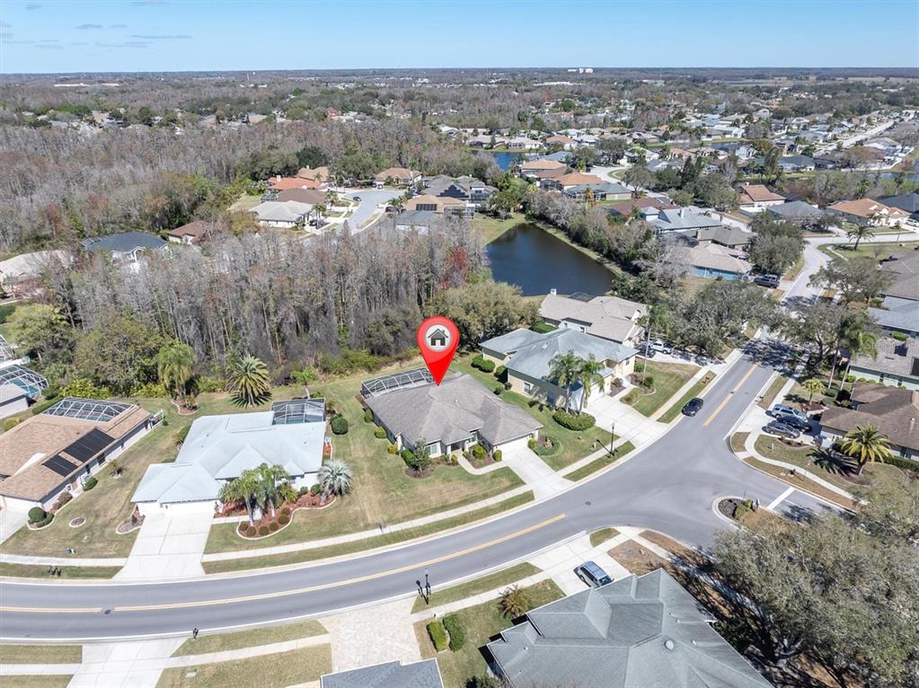 1014 Arlinbrook Drive Trinity, FL 34655 - Photo 47 of 69 an aerial view of a house with a yard