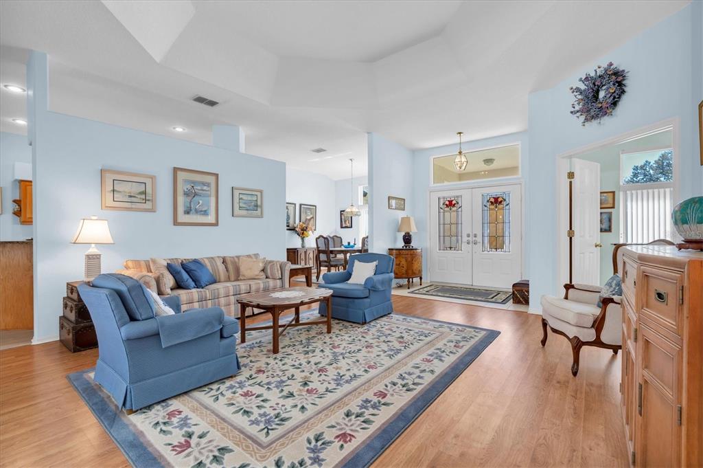 1014 Arlinbrook Drive Trinity, FL 34655 - Photo 9 of 69 a living room with furniture and a rug