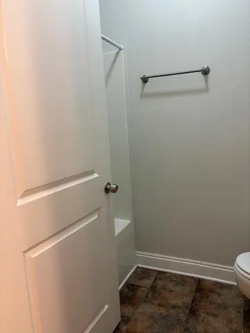 a view of a backyard with trees